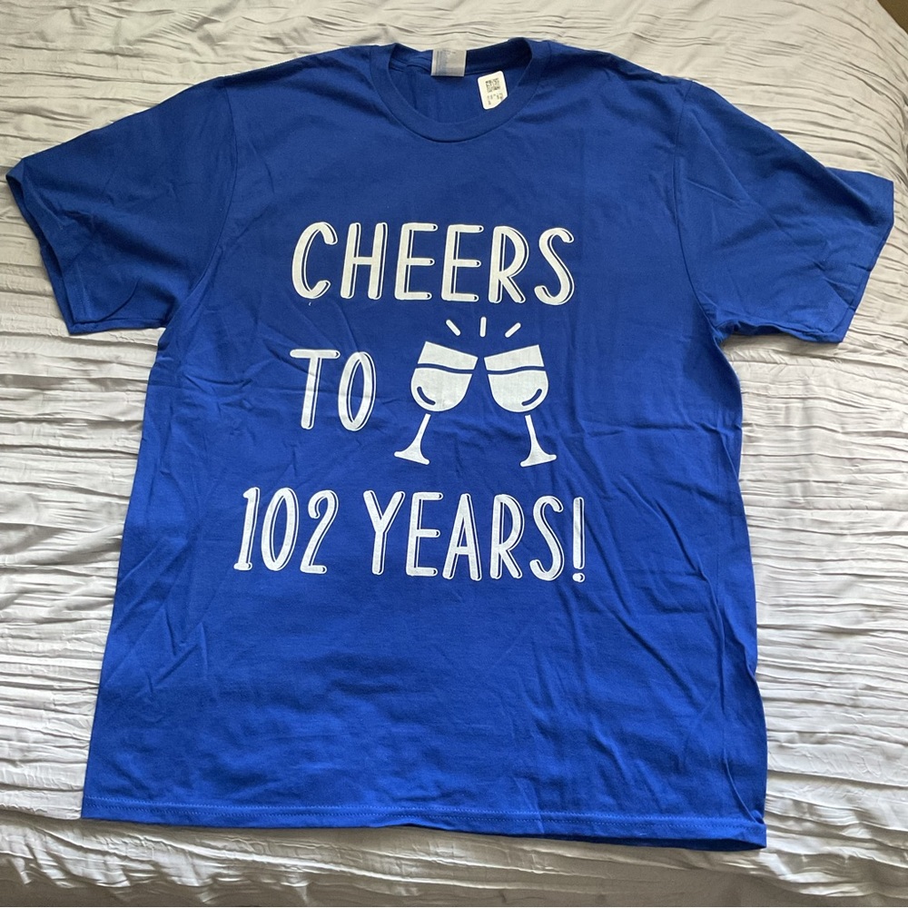 NWT size Large T-shirts. Cheers to 102 years.